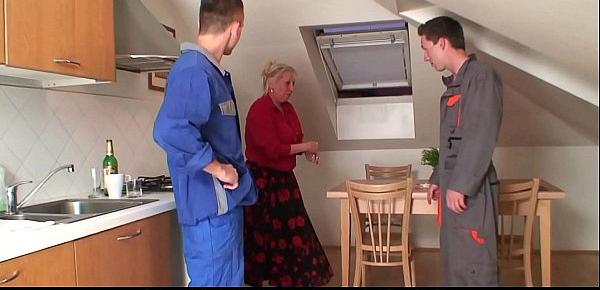  Two repairmen share very old blonde granny